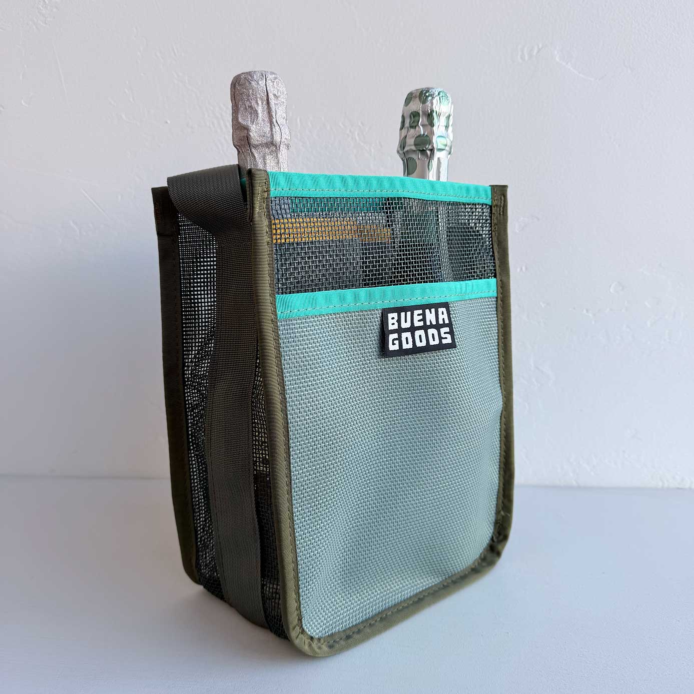 The Two-Bottle-Bag | Chenin Blanc features green trim and a Buena Goods label, holding two foil-wrapped bottles upright against a plain light background.