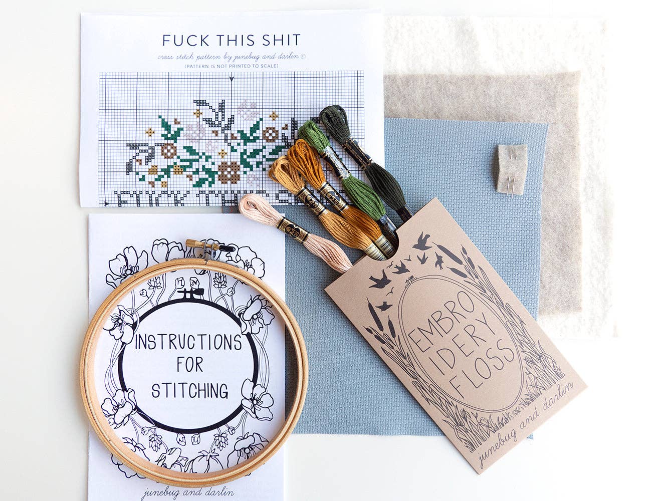 The Fuck This Shit Cross Stitch Kit is a beginner-friendly, handmade kit from Portland. It includes a hoop, fabric, colored floss, instructions, and the bold “FUCK THIS SHIT” pattern on white.