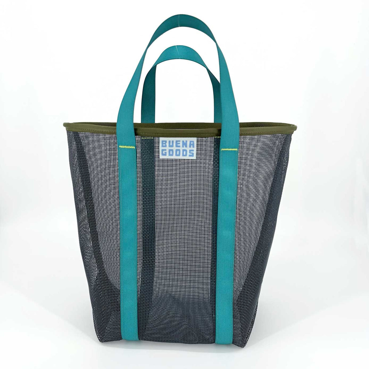 The Go Getter | Deep Blue is a durable mesh tote with deep blue handles and trim, featuring a rectangular BUENA GOODS label on the front. This reusable grocery bag is shown against a plain white background.
