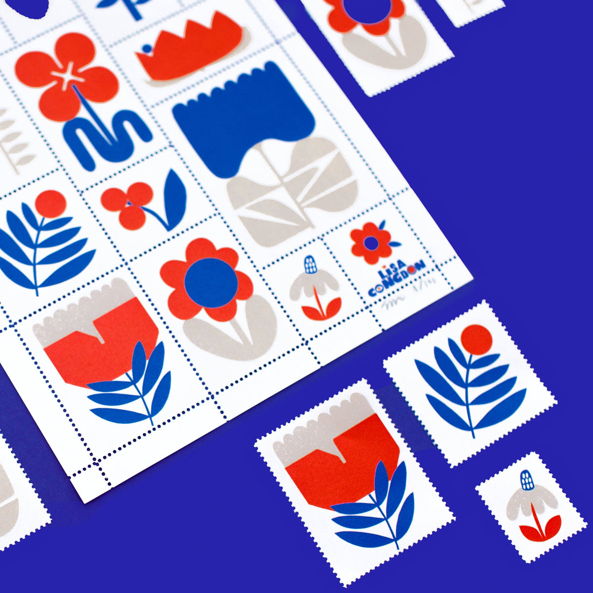 Poster Stamp Series 3 | March Flowers: a limited-edition sheet by Lisa Congdon with red, blue, and gray floral and abstract designs on blue. Some stamps are detached from the main sheet and displayed nearby.