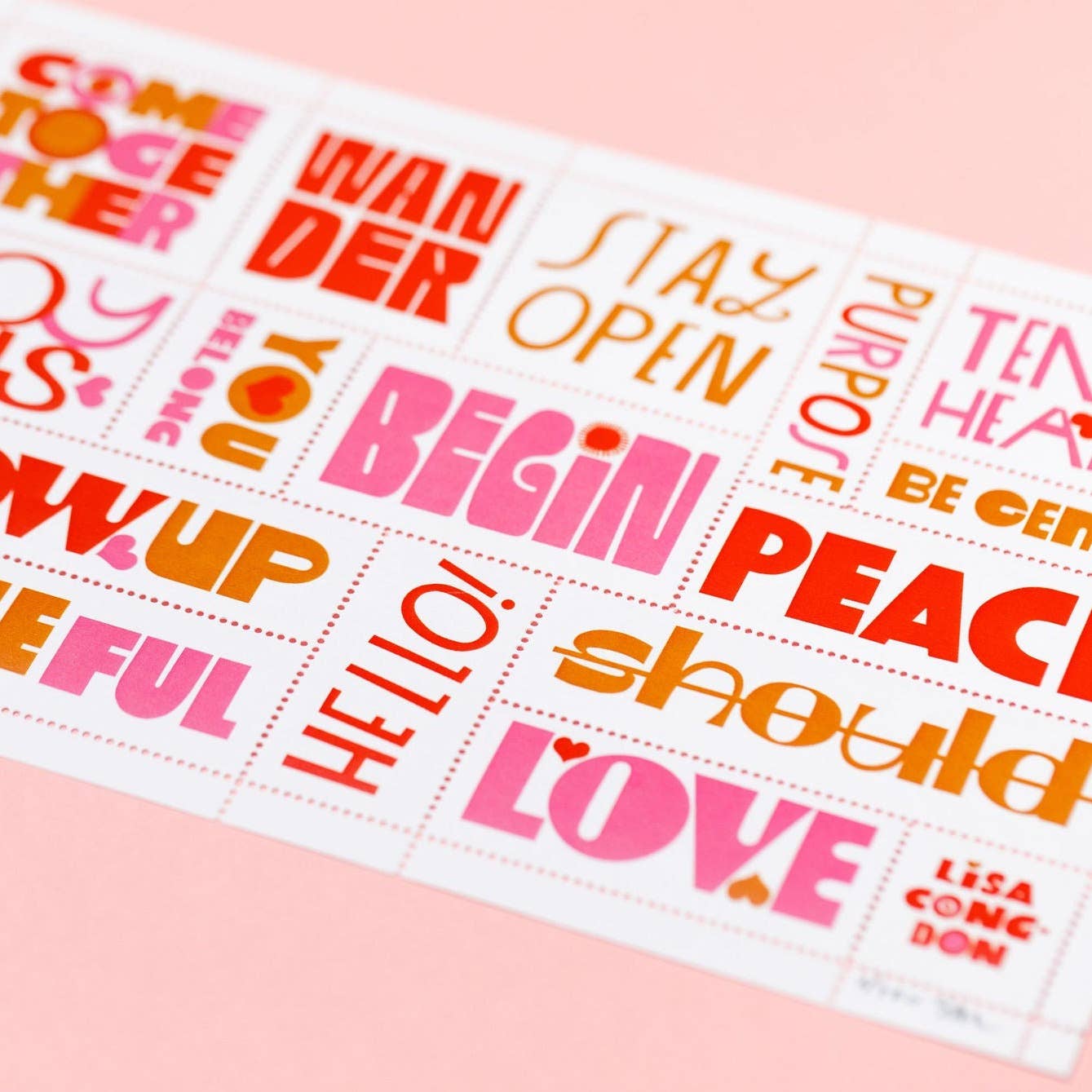 Add inspiration to your day with the Poster Stamp Series 5 | Words to Live By—a sheet of colorful rectangular stickers featuring motivational words like BEGIN, HELLO!, LOVE, SHOULD, and WANDER in bold pink, red, and orange on light pink.