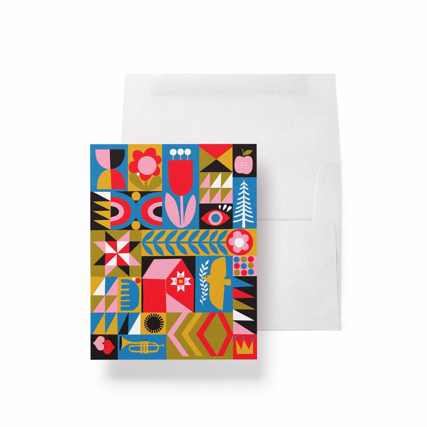 The Blank Quilt Squares Greeting Card features vibrant geometric and floral folk art in red, blue, yellow, black, and pink, shown with a plain white envelope on a white background.