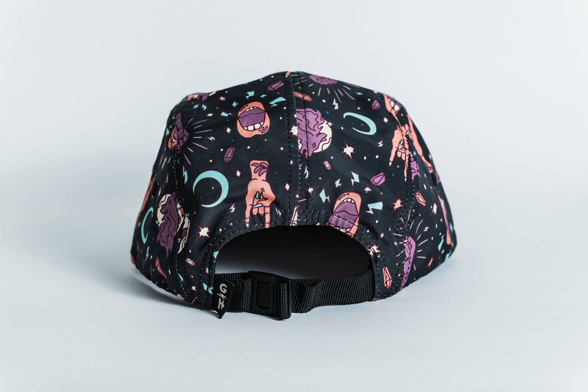 The Gritty Habits x Ground Keeper: Howl Collection 5-Panel Hat, in black, features vibrant cosmic cartoon designs and an adjustable back strap. This women-owned brand proudly supports Planned Parenthood.