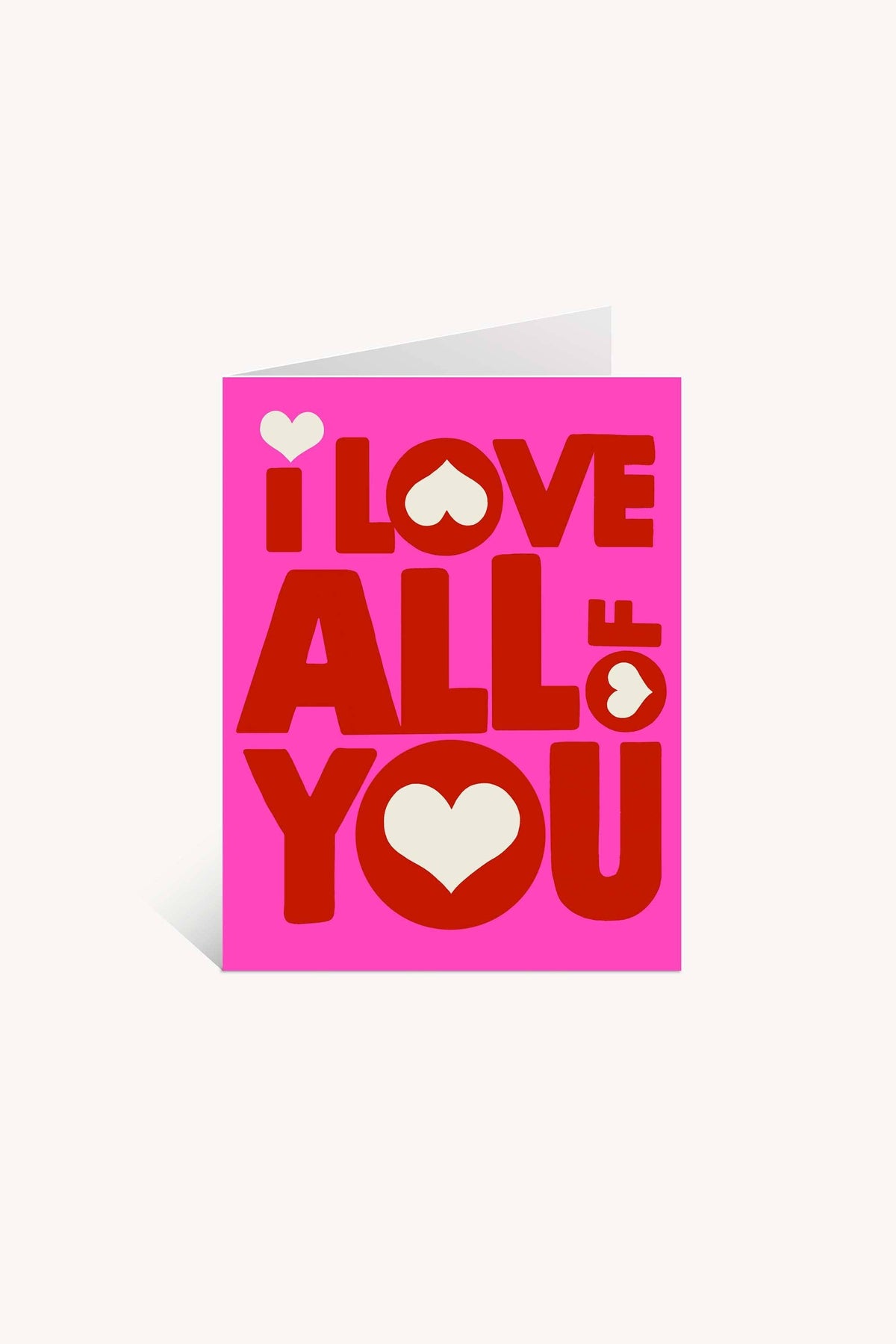 The "I Love ALL of You Greeting Card" by Lisa Congdon features a bright pink background and bold red and white lettering with hearts inside the O and A—a perfect blank card to share your love on any occasion.