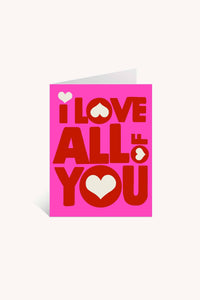 The "I Love ALL of You Greeting Card" by Lisa Congdon features a bright pink background and bold red and white lettering with hearts inside the O and A—a perfect blank card to share your love on any occasion.