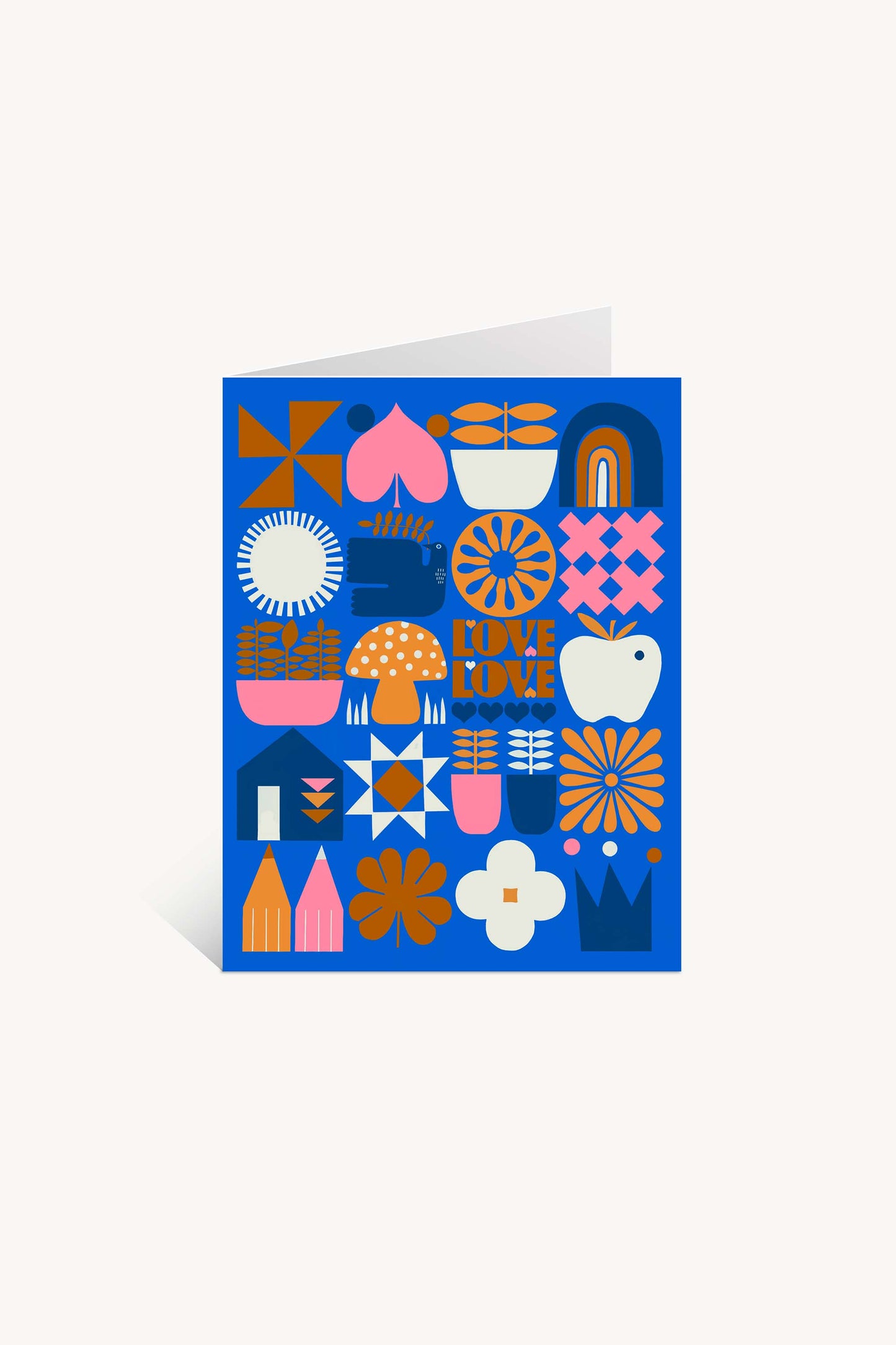 The Love Love Mushroom Greeting Card features a blue background with colorful geometric shapes, flowers, mushrooms, hearts, rainbows, and "LOVE LOVE" in the center—perfect for fans of folk-inspired and Lisa Congdon-style art.