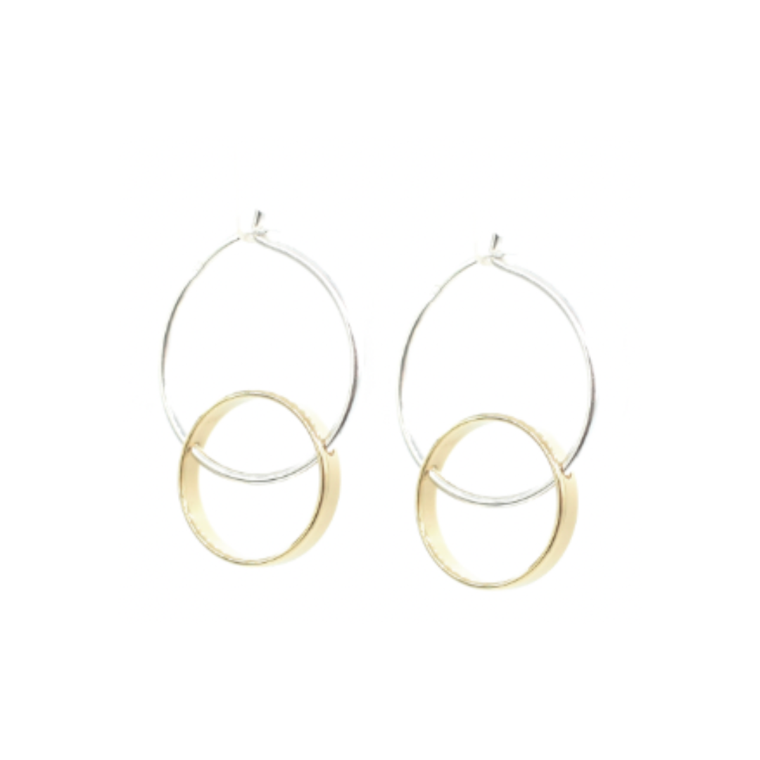 The Hello Halo Earrings feature two interlocking hoops—one silver, one gold—in a minimalist, modern design, showcasing Cape Town jewelry against a white background.