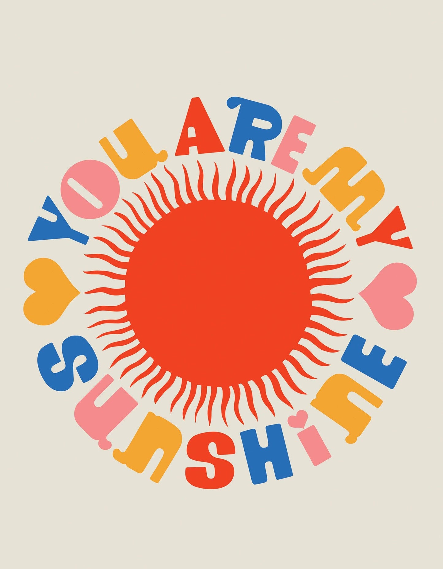 The You Are My Sunshine Greeting Card features playful, colorful letters in pink, blue, orange, and yellow on a cream background with a bright red sun and hearts. Designed by Lisa Congdon. Blank inside.